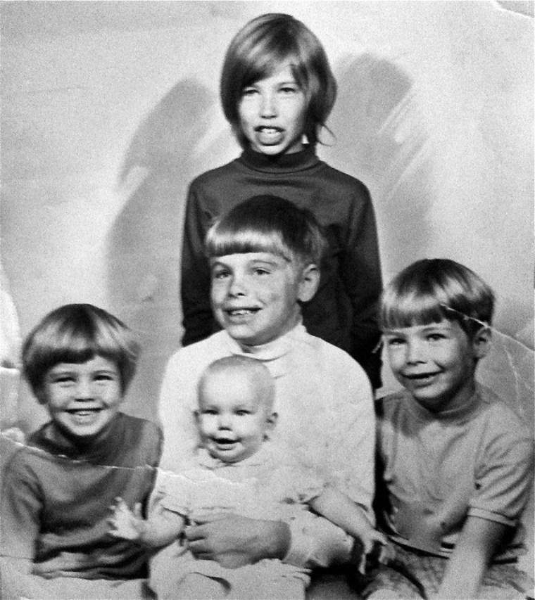 That's me at the top, saying cheese. I am the second oldest and the oldest girl. 